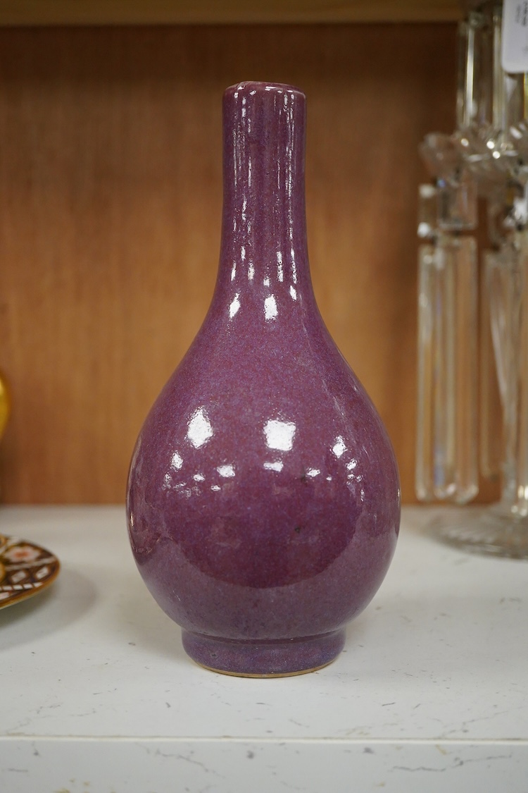 A Chinese crimson glazed bottle vase, 19cm